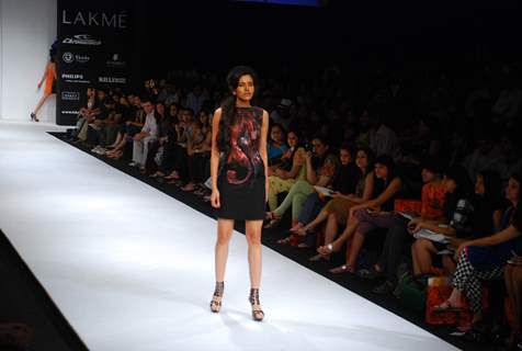 Model walks on the ramp for designer Walnut by nidhi & Divya Gambhir at Lakme Fashion Week 2010