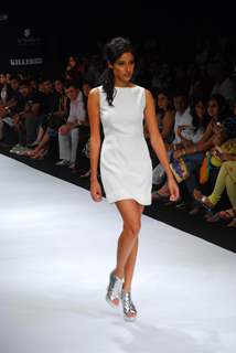 Model walks on the ramp for designer Walnut by nidhi & Divya Gambhir at Lakme Fashion Week 2010