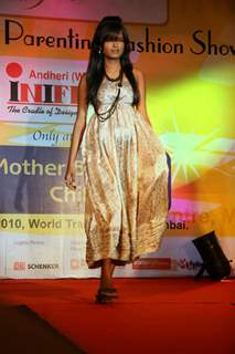 Pregnant women strike pose during Maternity and Parenting Fashion Show in Mumbai on Sunday,14 March 2010