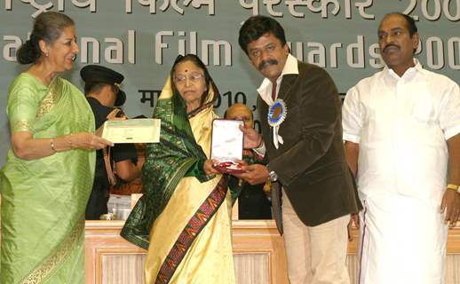 President Pratibha Devisingh Patil presenting best actor award to Upendra Limaye at the ''''56 National Film Awards'''', in New Delhi on Friday