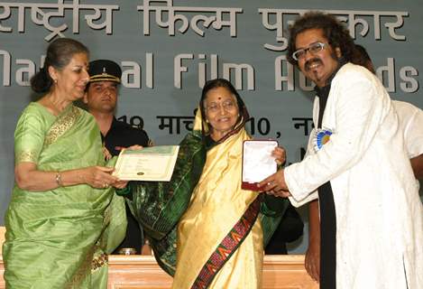 President Pratibha Devisingh Patil presenting best playback singer award to Hariharan at the ''''56 National Film Awards'''', in New Delhi on Friday