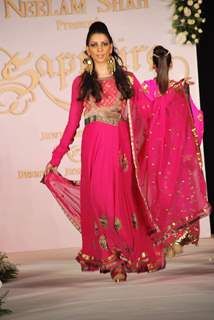 Model walks the ramp for designers Nirati and Neelam Shah