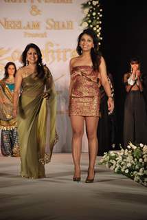 Zarine Khan walks the ramp for designers Nirati and Neelam Shah