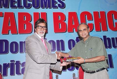 Bollywood Actor Amitabh Bachchan gestures during the handing over an ambulance to Bethany trust by State Bank of Travancore in Mumbai on Monday, 10 May 2010