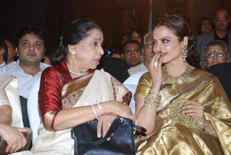 Asha Bhosle and Rekha at the launch of Gautam Rajadhyaksha''s book ''Chehere'' launch at JW Marriott