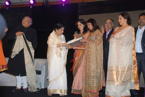 Lata Mangeshkar and Hema Malini at the launch of Gautam Rajadhyaksha''s book ''Chehere'' launch at JW Marriott