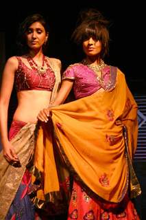 Models showcasing  designers Rahul,Gunjan and Payal Gupta''s creations  at the unveiling of bridal collections