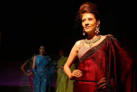 Models showcasing  designers Rahul,Gunjan and Payal Gupta''s creations  at the unveiling of bridal collections