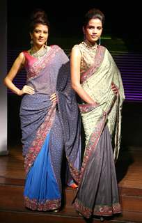 Models showcasing  designers Rahul,Gunjan and Payal Gupta''s creations  at the unveiling of bridal collections