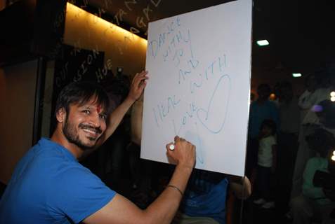 Vivek Oberoi poses for the photographers during a meet with Autistic Children