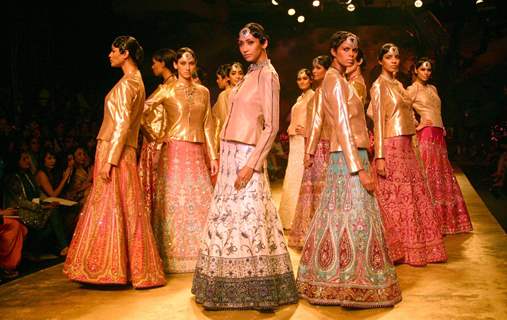 Models walking the ramp at Delhi Couture Week 2010