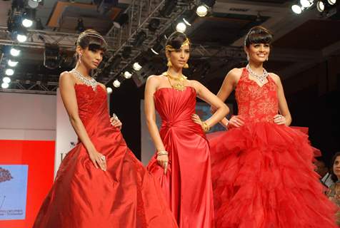 Models walk on the ramp at India International Jewellery Week