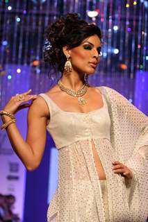 Models walk on the ramp at India International Jewellery Week