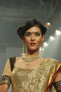 Model on the ramp at Gitanjali show at the India International Jewellery Week on Day 2