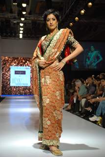 Model on the ramp at Gitanjali show at the India International Jewellery Week on Day 2