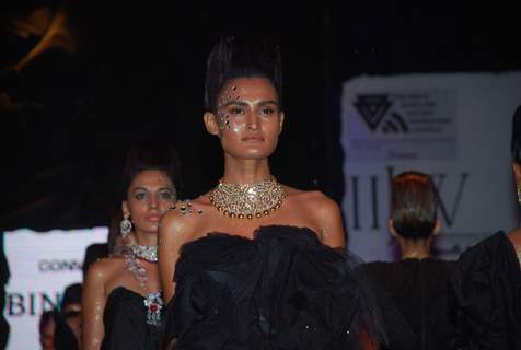 Model on the ramp at Bina Goenka show at the India International Jewellery Week on Day 4