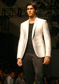 A model showcasing designer Troy Costa''s creations at the Ven Heusen India Mens Week, in New Delhi