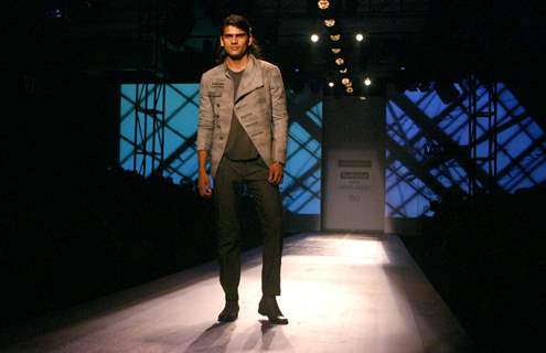 A model showcasing designers Rohit Gandhi and Rahul Khanna''s creation at the Ven Heusen India Mens Week, in New Delhi