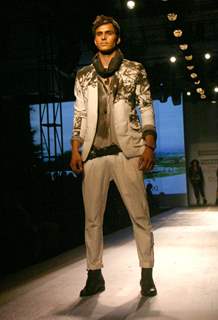 A model showcasing designers Rohit Gandhi and Rahul Khanna''s creation at the Ven Heusen India Mens Week, in New Delhi