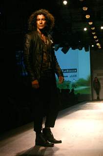 A model showcasing designers Rohit Gandhi and Rahul Khanna''s creation at the Ven Heusen India Mens Week, in New Delhi