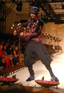 A model showcasing designer Rohit Bal''s creation at the Ven Heusen India Mens Week, in New Delhi