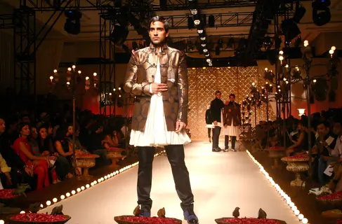 A model showcasing designer Rohit Bal''s creation at the Ven Heusen India Mens Week, in New Delhi