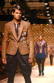 A model showcasing designer Rohit Bal''s creation at the Ven Heusen India Mens Week, in New Delhi