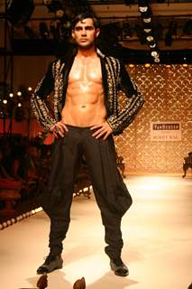 A model showcasing designer Rohit Bal''s creation at the Ven Heusen India Mens Week, in New Delhi