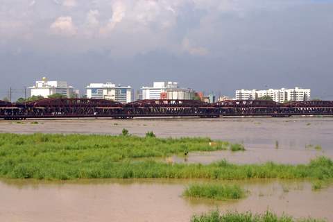 Overflowing Yamuna River at old bridge in Delhi on Saturday 11 Sep 2010