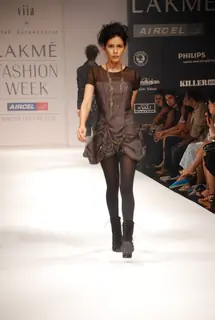 A model walks the runway in an Viia design at the Lakme Fashion Week