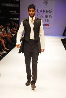 A model walks the runway in an Amalraj Sengupta design at the Lakme Fashion Week