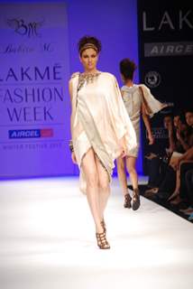 A model walks the runway in an Babita design at the Lakme Fashion Week