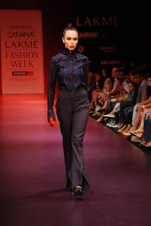 A model walks the runway in an Arjun Saluja design at the Lakme Fashion Week