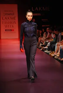 A model walks the runway in an Arjun Saluja design at the Lakme Fashion Week