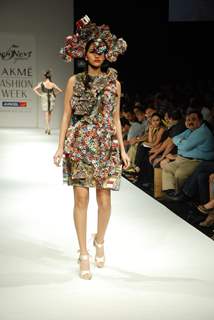 A model walks the runway in an Gen Next design at the Lakme Fashion Week