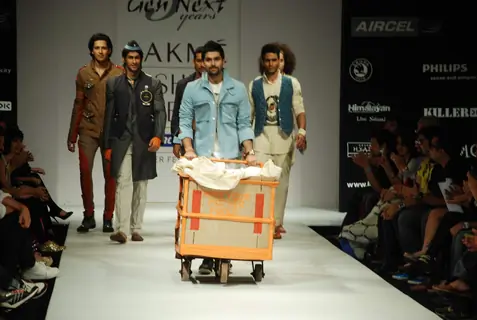A model walks the runway in an Gen Next design at the Lakme Fashion Week