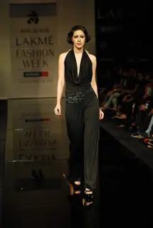 A model walks the runway in an Ritu Kumar design at the Lakme Fashion Week