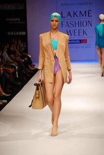 A model walks the runway in an Shrivan Narresh design at the Lakme Fashion Week