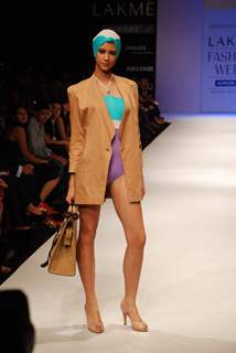 A model walks the runway in an Shrivan Narresh design at the Lakme Fashion Week