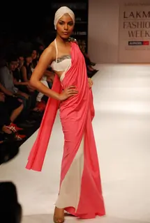 A model walks the runway in an Shrivan Narresh design at the Lakme Fashion Week