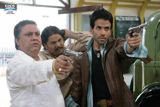 Tusshar and Manoj with a rifle