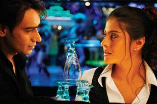 Ajay and Kajol looking in each other eyes