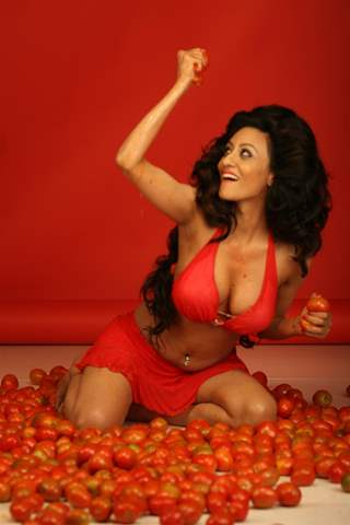 Brand Ambassador of Spanish Tomatina Festival model Vedita Pratap Singh plays with tomatoes and has fun in Mumbai