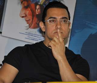 Aamir Khan launches DVD of their film DHOBI GHAT at the Crossword store in Mumbai