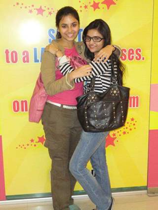 A still image of Deblina Chatterjee and her friend