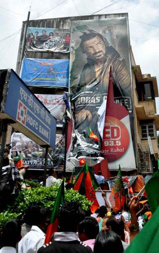 BJP activists protesting against the Hindi film 'Madras Cafe' in Mumbai