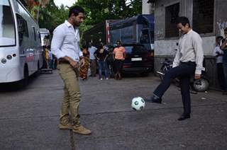 John Abraham playing football with Baichung Bhutia at Castrol Photo Shoot