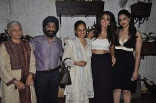 Surveen Chawla poses with family at the Screening of Hate Story 2