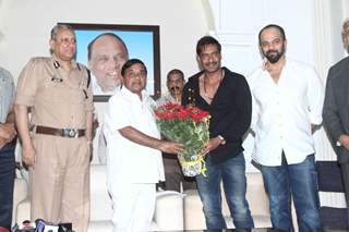 R R Patil felicitates Ajay Devgn with a bouquet of Flowers