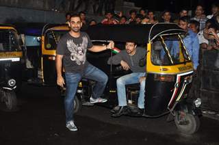 Emraan Hashmi and Kunal Deshmukh pose with the Auto Rickshaw